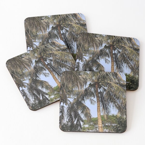 Item preview, Tall Coconut Palm Trees Against Blue Sky – Tropical Nature Photography Wall Print designed and sold by AwesomeDigiShop.