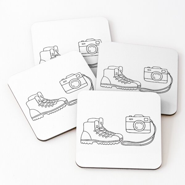 Item preview, A camera next to a pair of hiking boots, strap trailing on the ground   designed and sold by rasagamastore.