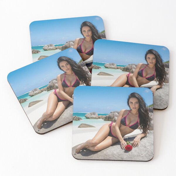 Item preview, Tropical Rose – Woman in Black and Pink Bikini on Beach Rocks designed and sold by SunsetAngelsAI.