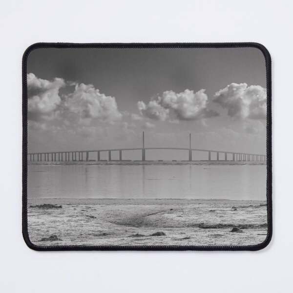 Item preview, The Sunshine Skyway Bridge stretches gracefully across calm waters on a cloudy December day designed and sold by EyezWatchin.