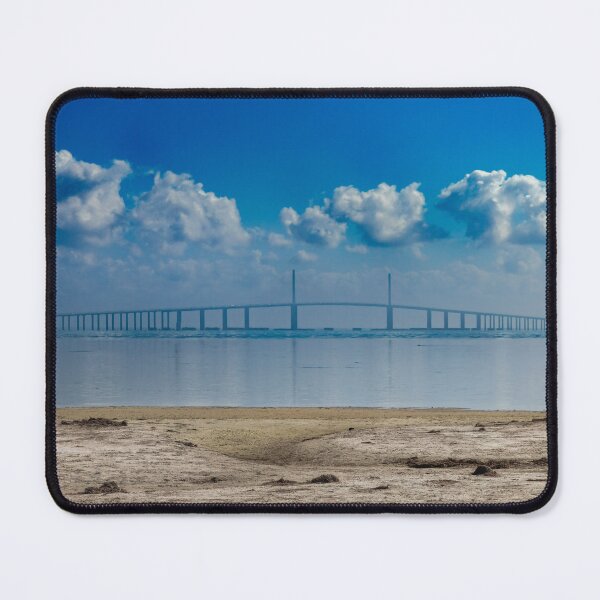 Item preview, The Sunshine Skyway Bridge stretches gracefully across calm waters on a cloudy December day designed and sold by EyezWatchin.