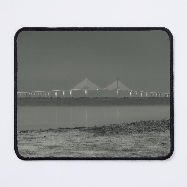 Item preview, The Sunshine Skyway Bridge rises gracefully against the night sky, illuminated in a striking display of color and light designed and sold by EyezWatchin.