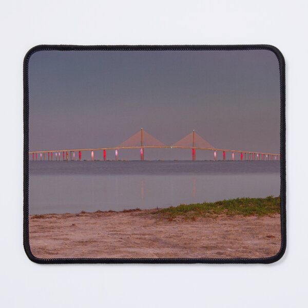 Item preview, The Sunshine Skyway Bridge rises gracefully against the night sky, illuminated in a striking display of color and light designed and sold by EyezWatchin.