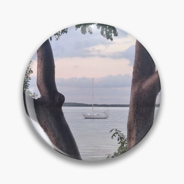 Item preview, Boat on Serene Sea Framed by Trees designed and sold by CoastalCalmCo.