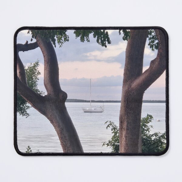 Item preview, Boat on Serene Sea Framed by Trees designed and sold by CoastalCalmCo.