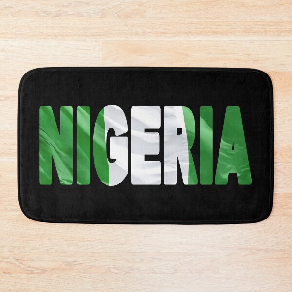 Item preview, NIGERIA - Flag Flying in Wind cut to Letters Souvenir Sticker Shirt T-Shirt designed and sold by Adam Gormley.