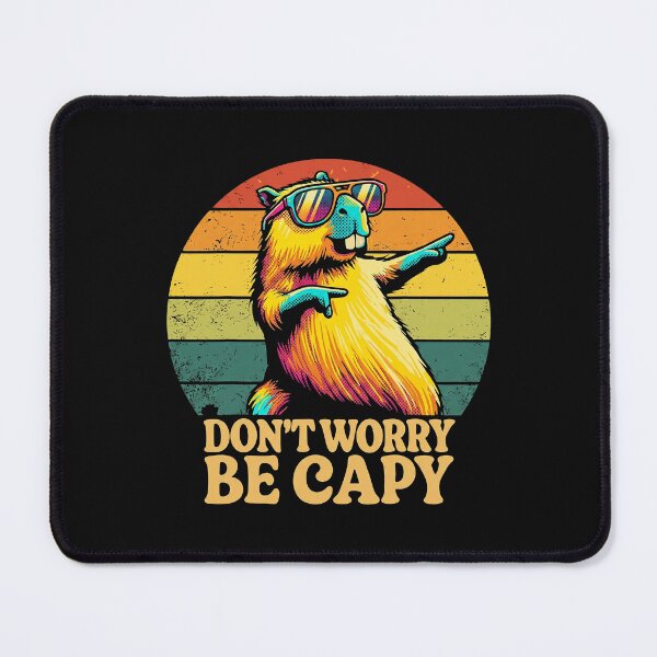 Item preview, Funny Capybara Don't Worry Be Capy Retro Sunset Pun Graphic designed and sold by AdyKurniawan.