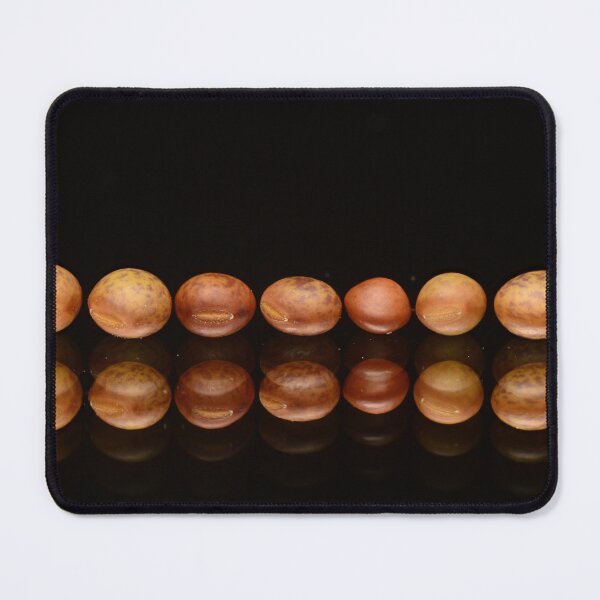 Item preview, Macro of Brown Seeds in Row with Reflection on Black Background designed and sold by Goiko7Margarita.