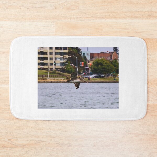Item preview, Pelican Gliding Over Waterway designed and sold by Phakade's Photos.