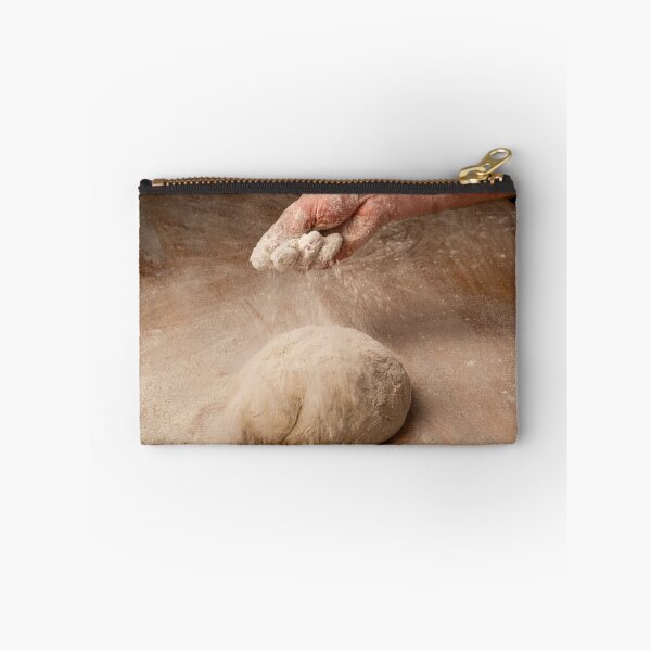 Item preview, Baker sprinkles flour on bread dough designed and sold by Ingo Gerlach.