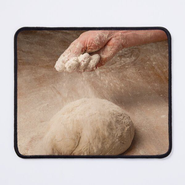 Item preview, Baker sprinkles flour on bread dough designed and sold by Ingo Gerlach.