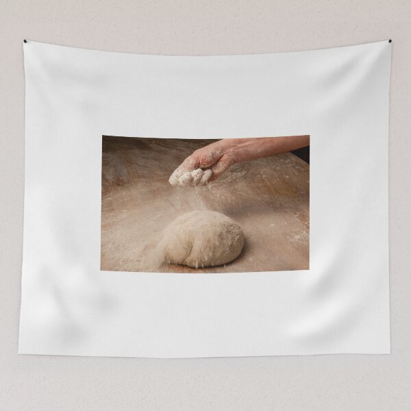 Item preview, Baker sprinkles flour on bread dough designed and sold by Ingo Gerlach.