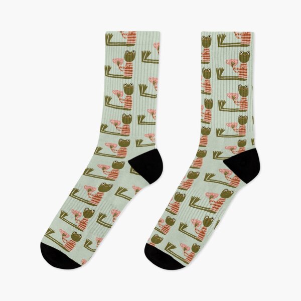 Item preview, A cozy and funny illustration of a long-legged frog  coffee lover designed and sold by Dormitria.
