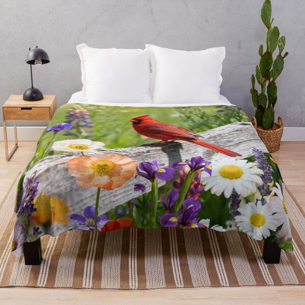 Item preview, Red Cardinal Perched on a Rustic Picket Fence with Vibrant Wildflowers designed and sold by DrewRomeoCo.