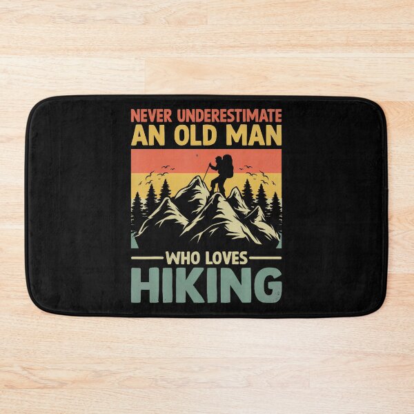 Item preview, Never Underestimate An Old Man Who Loves Hiking designed and sold by markettathorn.