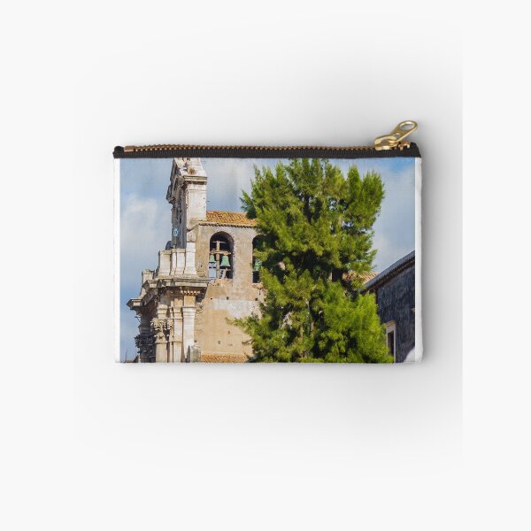Item preview, Historic Stone Church Tower With Bells Overlooking Quiet Town Street and Green Tree Under Blue Sky designed and sold by Nmallia.