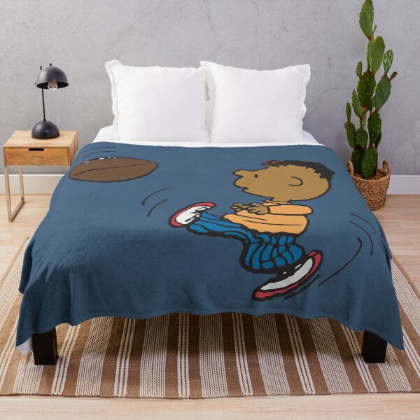 Item preview, franklin playing football classic cartoon snoopy designed and sold by jaqebistyrli.