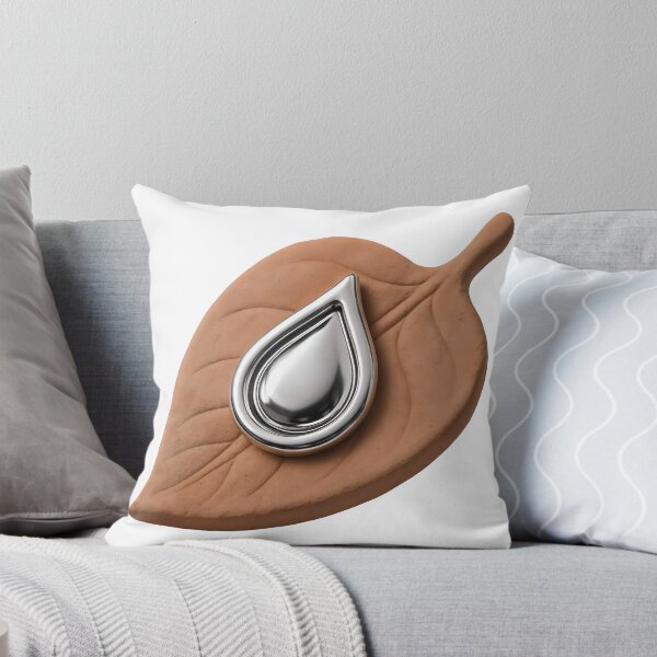 Item preview, Silver teardrop emblem on terracotta leaf under studio lighting designed and sold by Creative88Art.