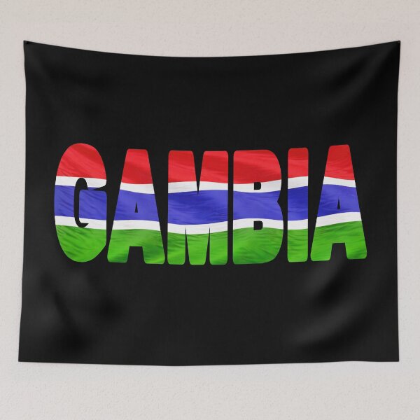 Item preview, GAMBIA - Flag Flying in Wind cut to Letters Souvenir Sticker Shirt T-Shirt designed and sold by Adam Gormley.