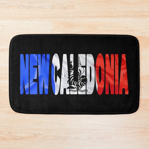 Item preview, NEW CALEDONIA - Flag Flying in Wind cut to Letters Souvenir Sticker Shirt designed and sold by Adam Gormley.