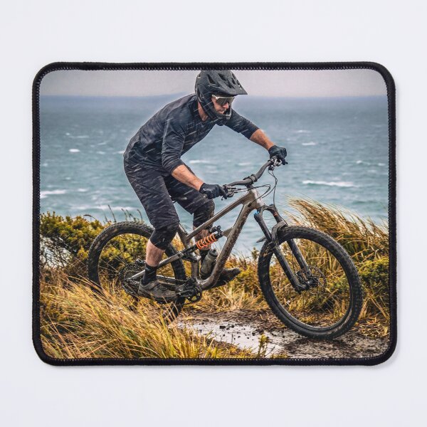 Item preview, Rider in the Rain – Moody Coastal MTB Landscape for Adventure Lovers. designed and sold by Hinson MTB Visuals.