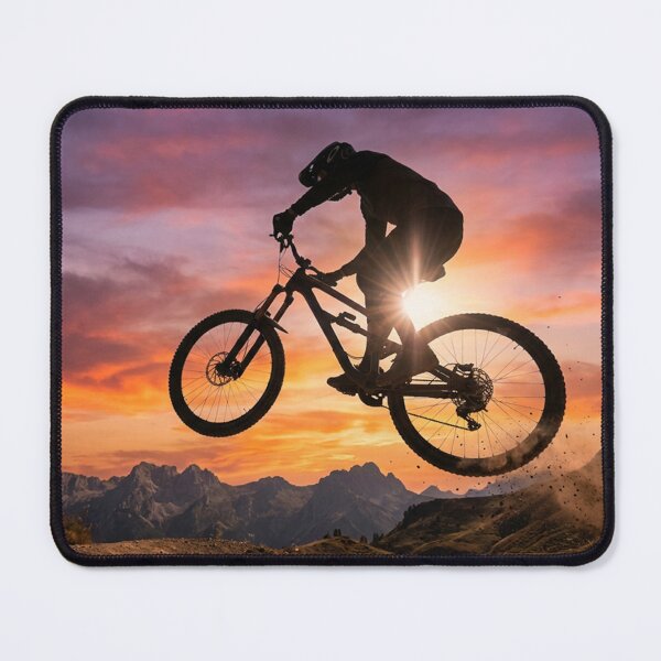 Item preview, Mountain Bike Jump at Sunset – Epic MTB Silhouette Adventure Art designed and sold by thebigleebowski.