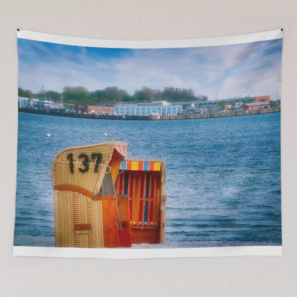 Item preview, A picture of the Baltic Sea in Germany with a naval military base in the background and beach chairs in the foreground. designed and sold by Creative Waves Media.