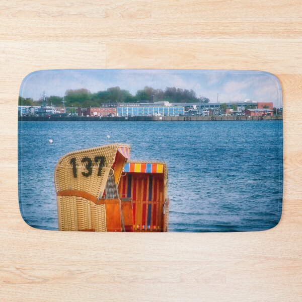 Item preview, A picture of the Baltic Sea in Germany with a naval military base in the background and beach chairs in the foreground. designed and sold by Creative Waves Media.