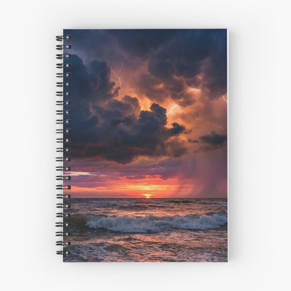 Item preview, Dramatic lightning bolts striking the ocean during a golden hour storm. designed and sold by OnceInMemories.