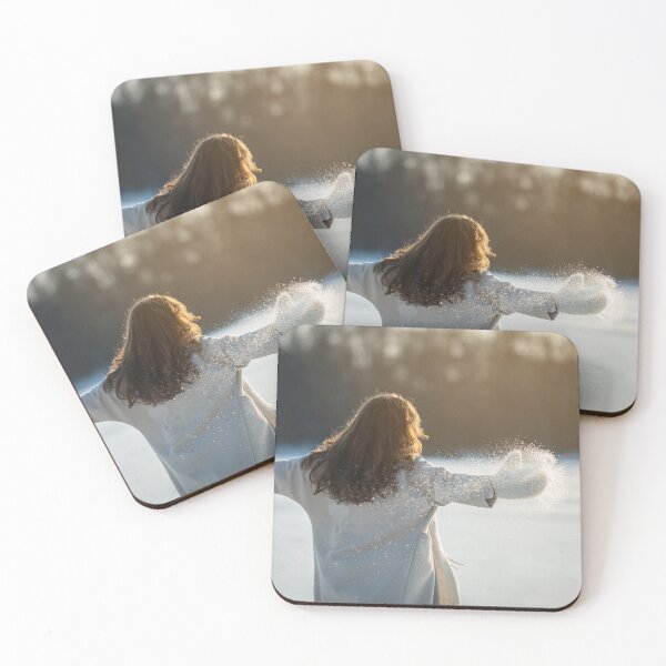 Item preview, A woman in a white coat walks on a frozen lake and enjoys the sun. designed and sold by ewawrona.