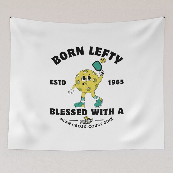 Item preview, Left-handed : born lefty, blessed with a mean cross-court dink designed and sold by Peerless-Prime.
