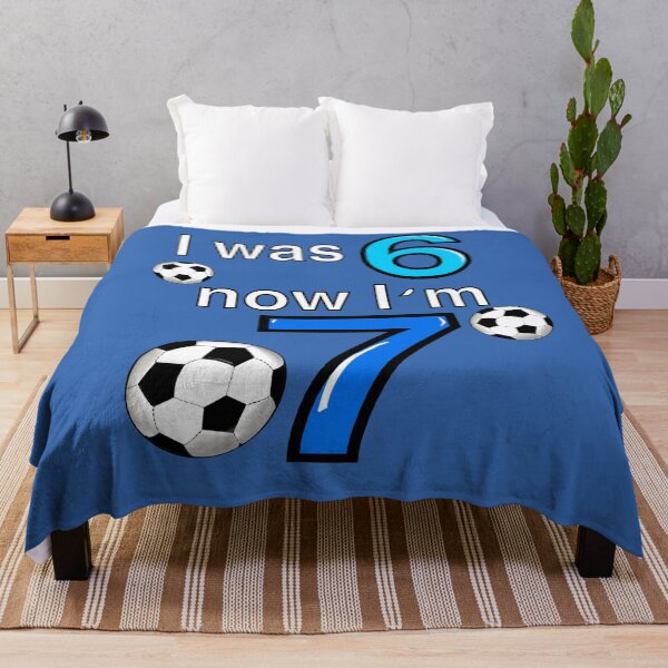 Item preview, I was 6 now I’m 7 7th Birthday boy - Six seven meme Football, soccer themed funny gift ideas for boys with the blue and white text “I was 6 now I’m 7” designed and sold by Artonmytee.
