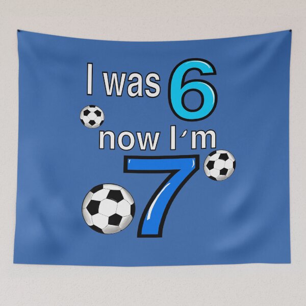 Item preview, I was 6 now I’m 7 7th Birthday boy - Six seven meme Football, soccer themed funny gift ideas for boys with the blue and white text “I was 6 now I’m 7” designed and sold by Artonmytee.