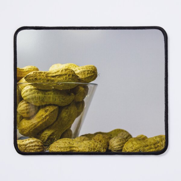 Item preview, Group Of Peanuts In A Glass Bowl And On The Table, Fresh Shelled Nuts Display designed and sold by Nmallia.