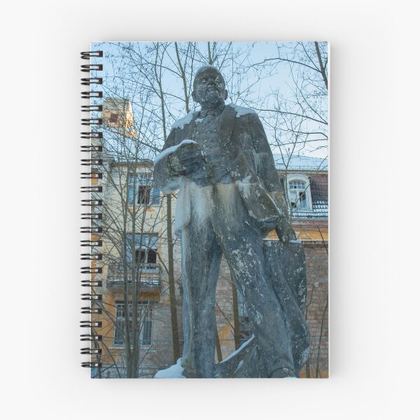 Item preview, Abandoned Lenin statue in front of a dilapidated sanatorium in winter – Lost Place Urbex Photography designed and sold by MarkusUrbex.