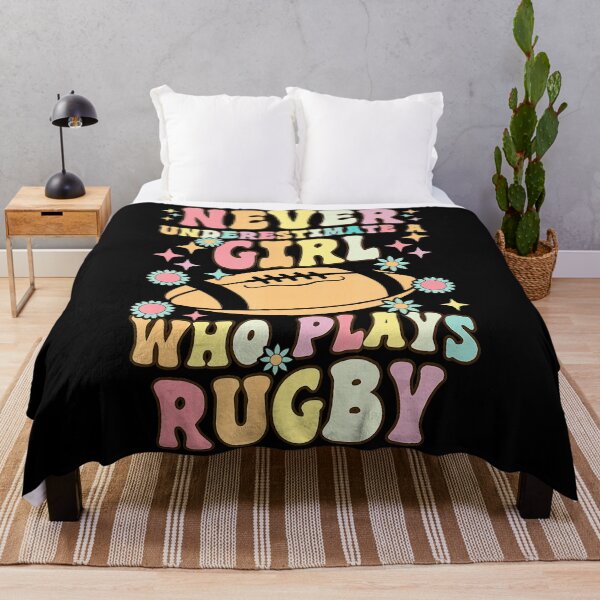 Item preview, Never Underestimate A Girl Who Plays Rugby Groovy Retro Typography designed and sold by GabrieSketcham.