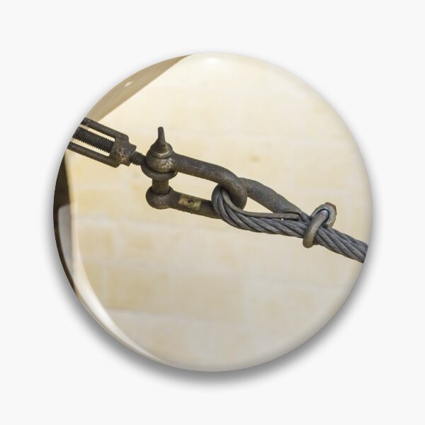 Item preview, Industrial Steel Cable With Turnbuckle Clamp Securing Anchor To Stone Wall designed and sold by Nmallia.