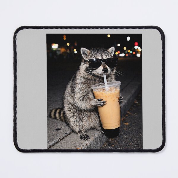 Item preview, Funny Raccoon Drinking Iced Coffee Animal Meme Graphic Tee  designed and sold by mjohnson9.