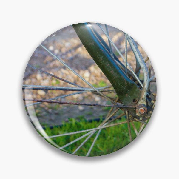 Item preview, Close Up Of A Bicycle Wheel And Spokes With Green Frame In Outdoor Setting designed and sold by Nmallia.