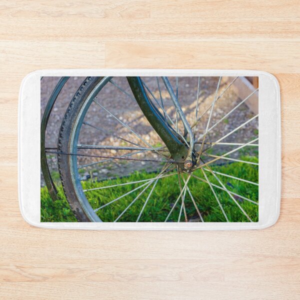 Item preview, Close Up Of A Bicycle Wheel And Spokes With Green Frame In Outdoor Setting designed and sold by Nmallia.
