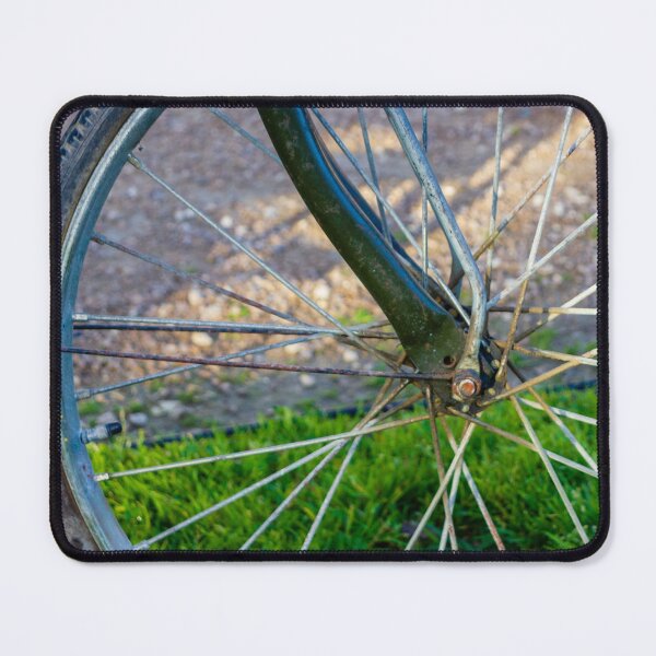 Item preview, Close Up Of A Bicycle Wheel And Spokes With Green Frame In Outdoor Setting designed and sold by Nmallia.