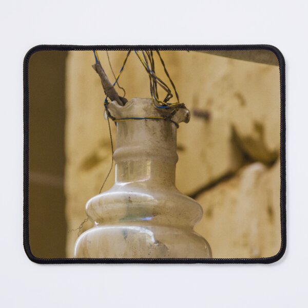Item preview, Old Hanging Light Bulb With Pink Socket And Exposed Wires In A Deteriorated Interior Scene designed and sold by Nmallia.