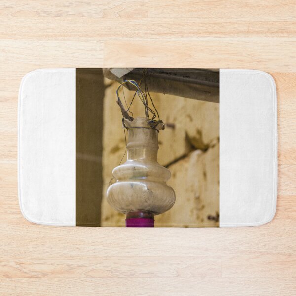 Item preview, Old Hanging Light Bulb With Pink Socket And Exposed Wires In A Deteriorated Interior Scene designed and sold by Nmallia.