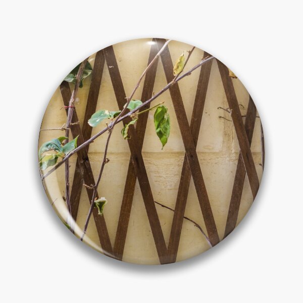 Item preview, Vine-Covered Wooden Lattice Against Yellow Wall Creating Rustic Garden Fence designed and sold by Nmallia.