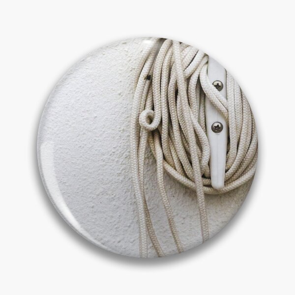 Item preview, Coiled Rope on Wall Hook With Long White Cord on Textured Wall designed and sold by Nmallia.