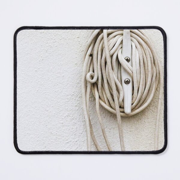 Item preview, Coiled Rope on Wall Hook With Long White Cord on Textured Wall designed and sold by Nmallia.