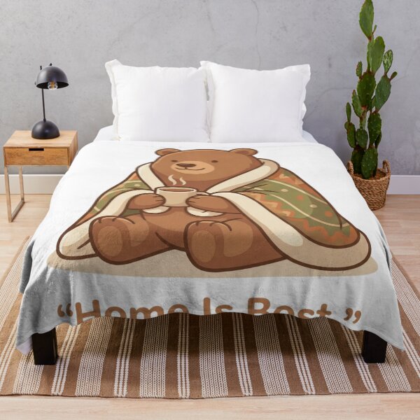 Item preview, Cozy cartoon bear wrapped in a blanket holding a warm cup of coffee or tea designed and sold by rajeshbac.