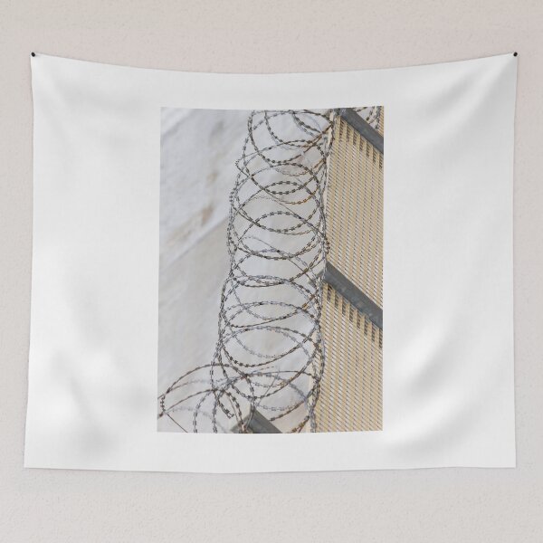 Item preview, Coiled Barbed Wire Fence Ribbons Create Stark Security Barrier Against Intrusion designed and sold by Nmallia.