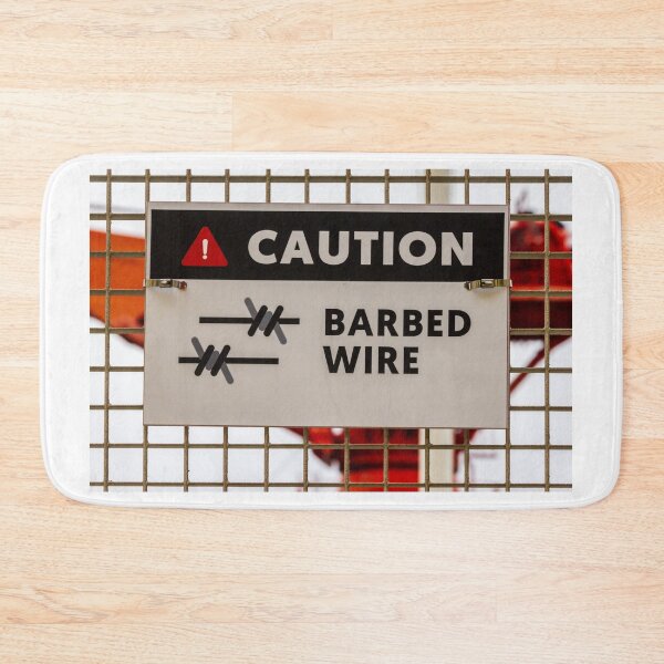 Item preview, Caution Barbed Wire Sign On Metal Fence Warns Of Hazardous Area designed and sold by Nmallia.