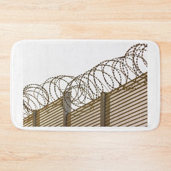 Item preview, Coiled Barbed Wire Fence Ribbons Create Stark Security Barrier Against Intrusion designed and sold by Nmallia.